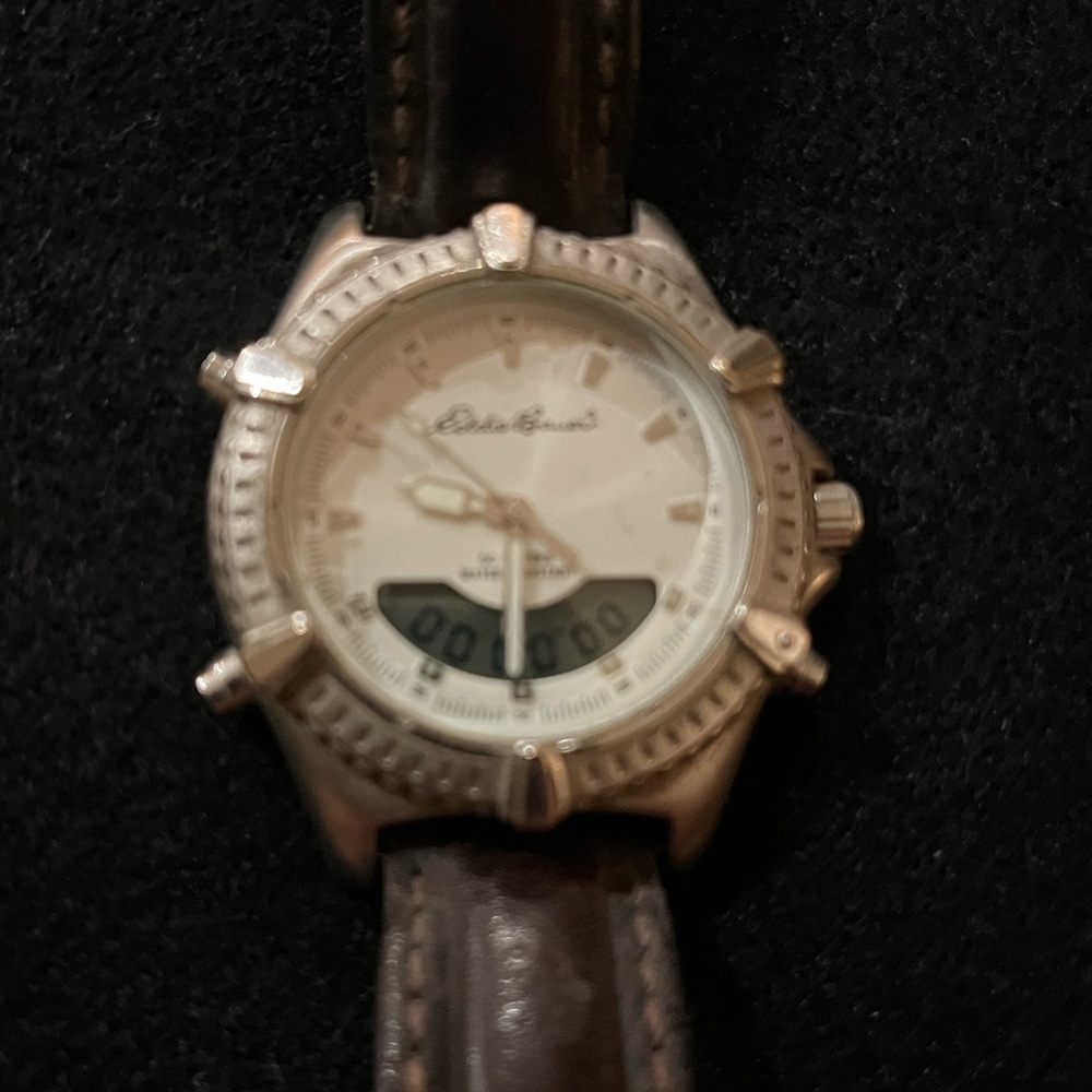 Eddie Bauer Mens leather band watch with stopwatch feature.